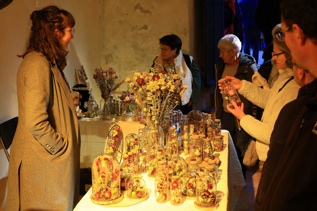 Le stand de l'atelier Florette pendant le marché de NOël de l'abbaye de Hambye en 2024